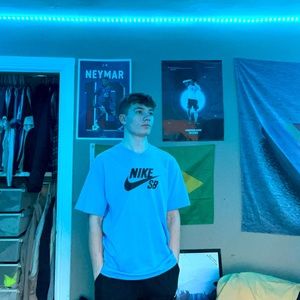 Men’s blue Nike SB t-shirt.